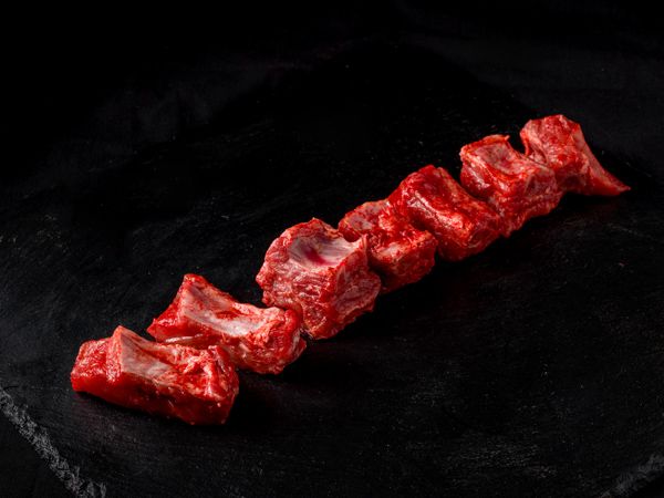 Costilla de cerdo adobada troceada