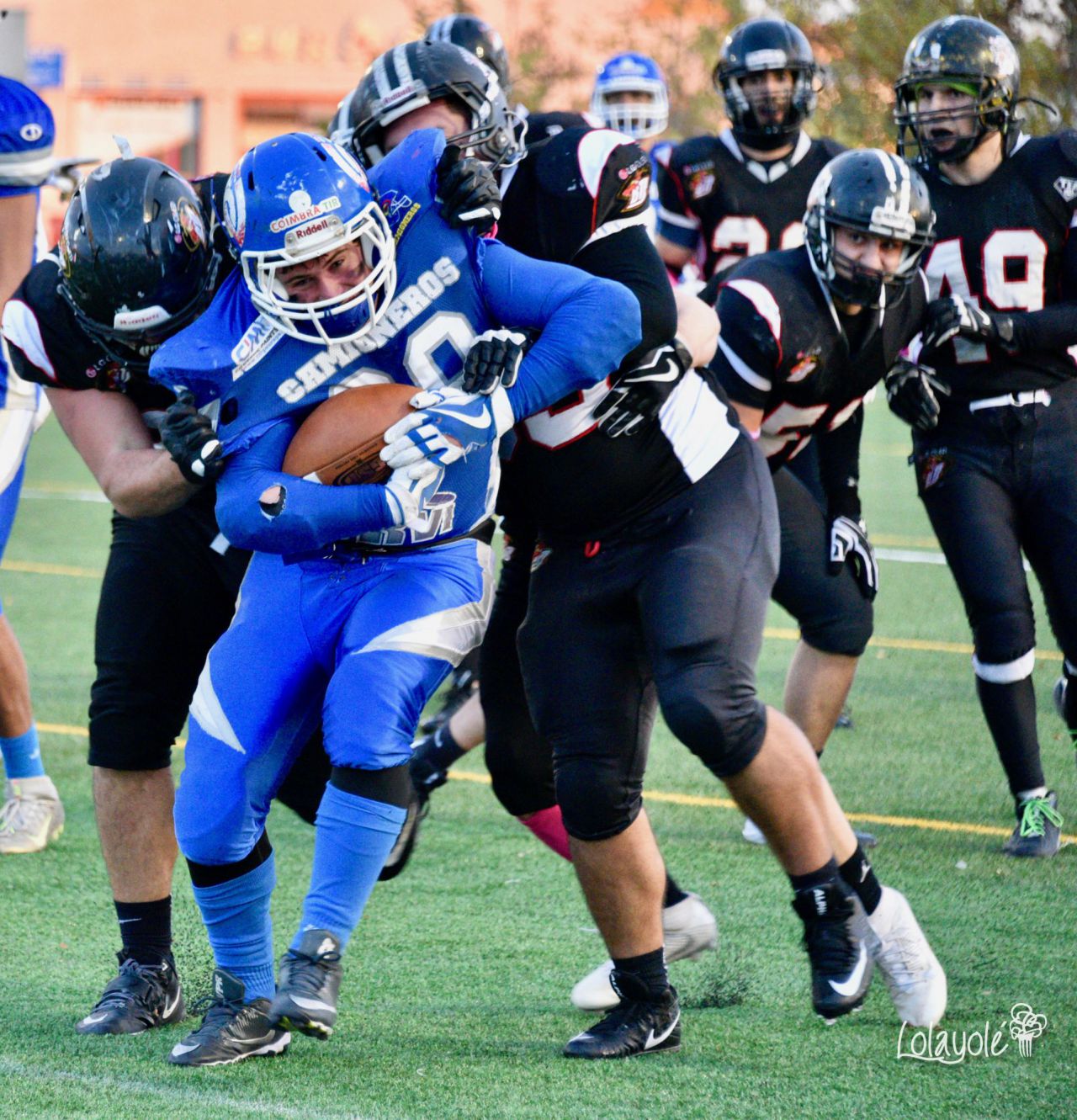 LG OLED Black Demons Las Rozas (blanco y negro) vs Camioneros Coslada (azul).