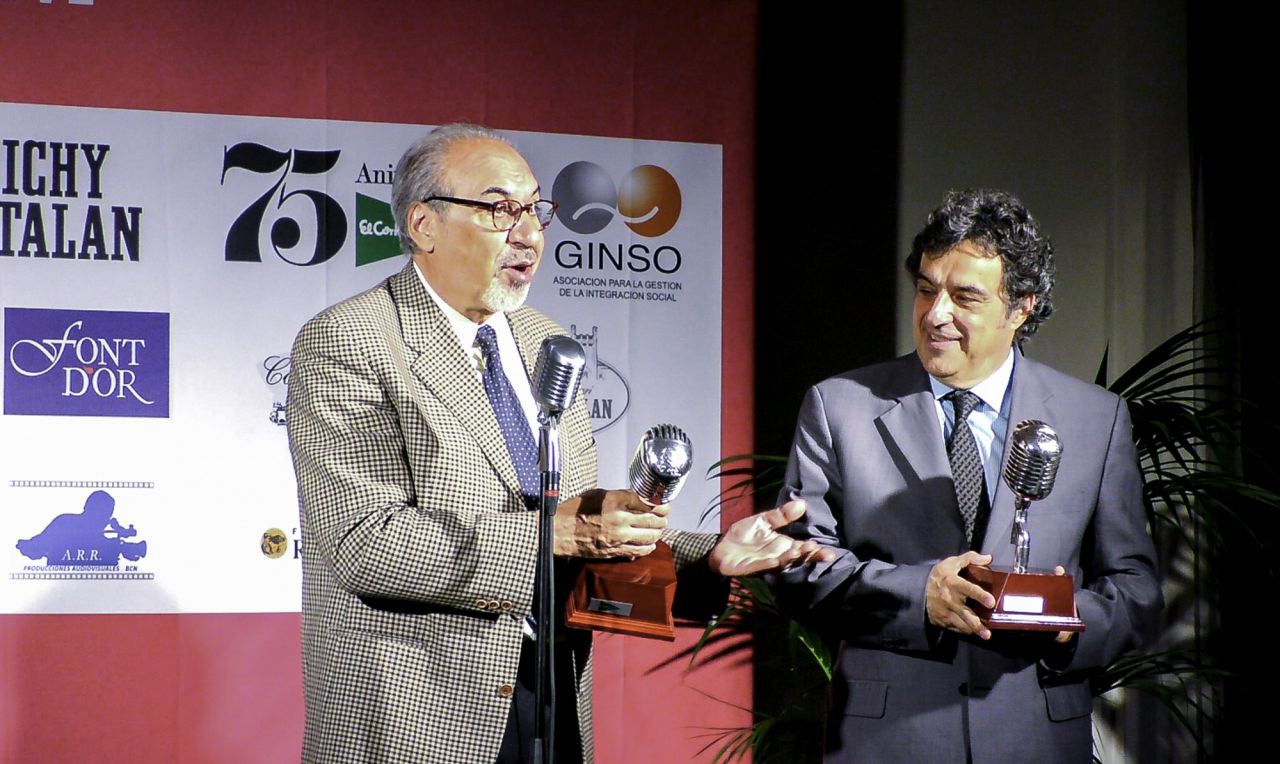 Los periodistas gráficos Gallego y Rey.