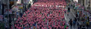 Una marea rosa de 33.000 corredoras tiñe el centro