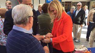 Cifuentes se va del Pleno para defender la "unidad de España" en un acto del PP