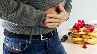 3 causas para tu dolor en la boca del estómago y espalda