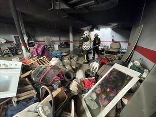 Desalojados 20 vecinos de Leganés por un incendio en un garaje