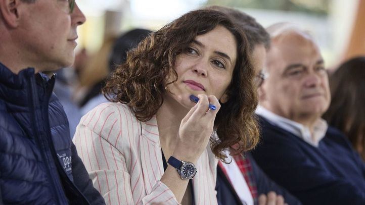 La presidenta de la Comunidad de Madrid, Isabel Díaz Ayuso, interviene durante la Fiesta de la Hispanidad del PP, en el Auditorio del Parque El Paraíso