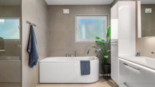 ¿Cómo crear una cómoda zona de relax con una bañera de esquina?