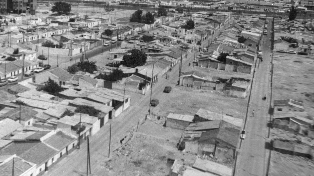 Vista aérea del Pozo con chabolas y antes de la llegada del asfalto. Foto: Un hombre sin miedo